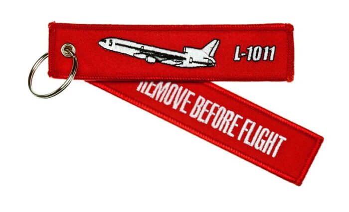 Key Ring With `Remove Before Flight ` On One Side And `L-1011' And Silhouette On Other Side - 13X3Cm